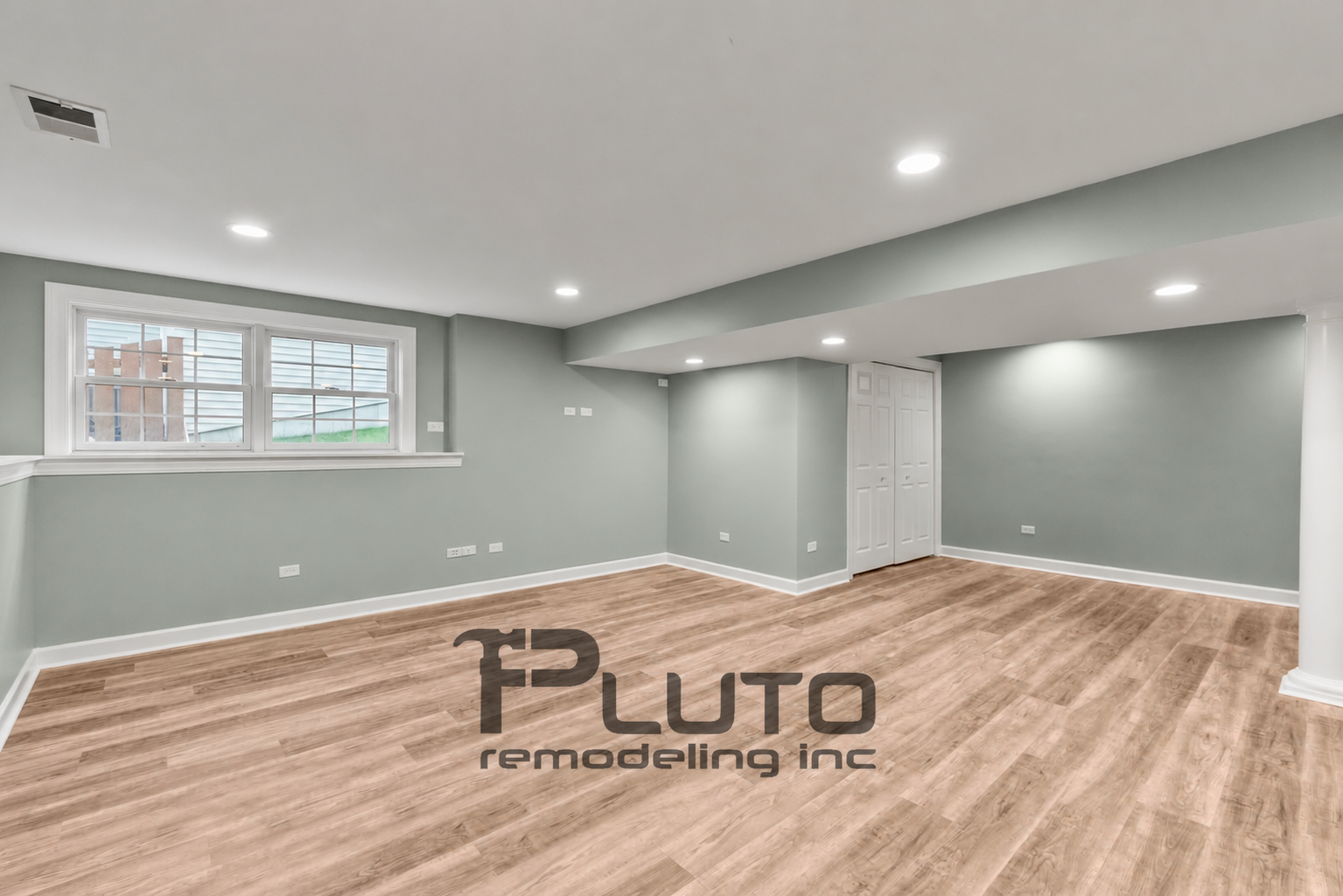 Bright lower-level living space — Pluto Remodeling