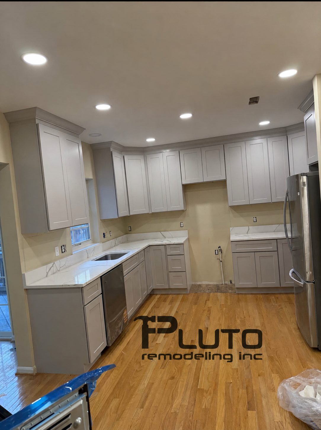 In progress — new cabinets and countertops — Pluto Remodeling