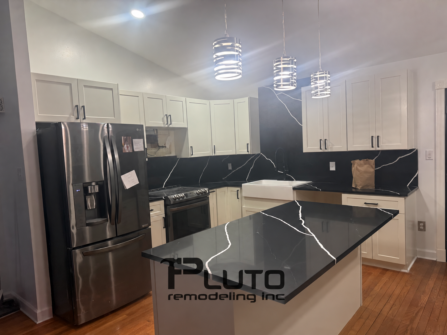 Farmhouse sink and full-height backsplash — Pluto Remodeling