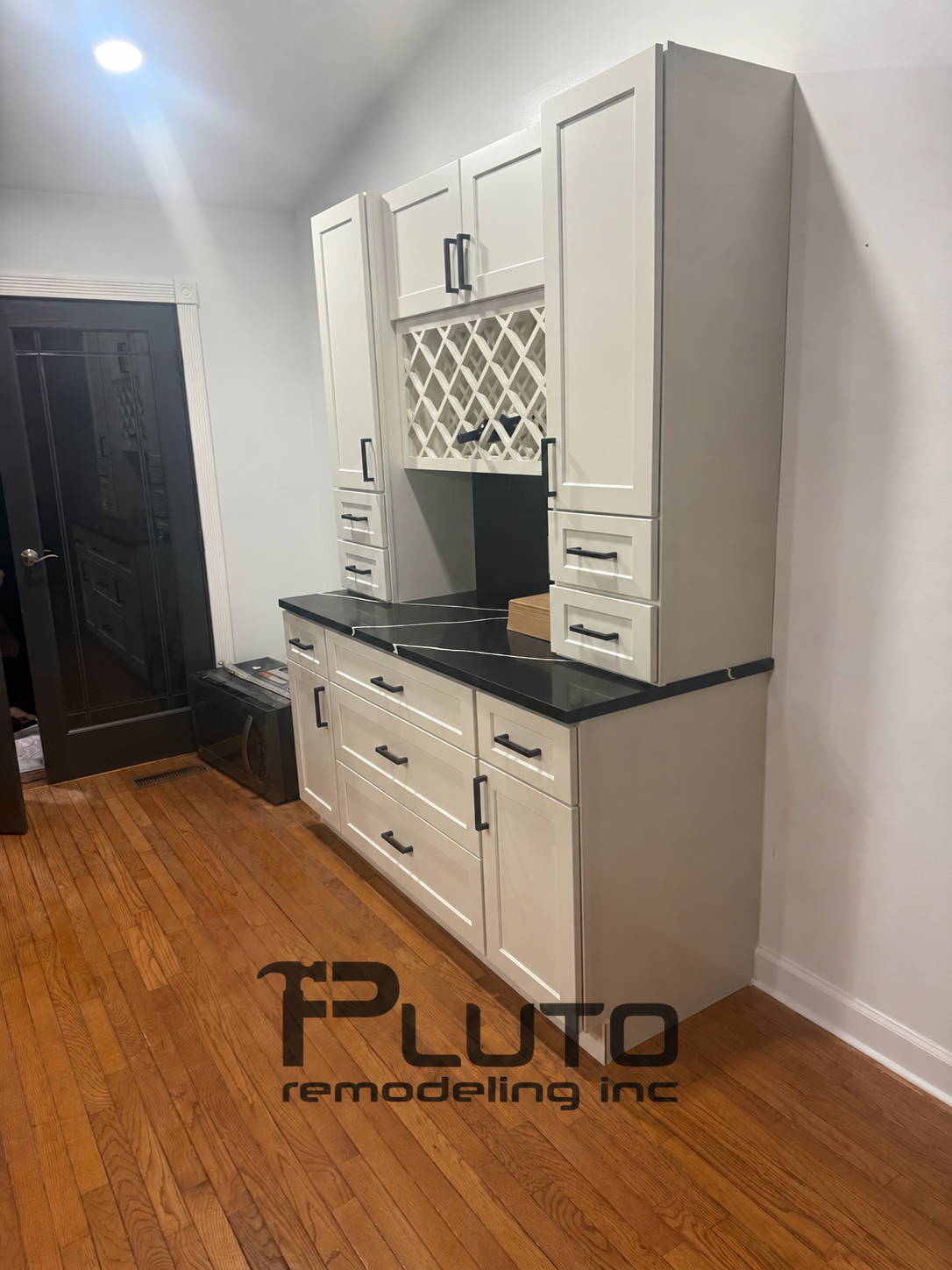 Cabinet storage and wine rack — Pluto Remodeling