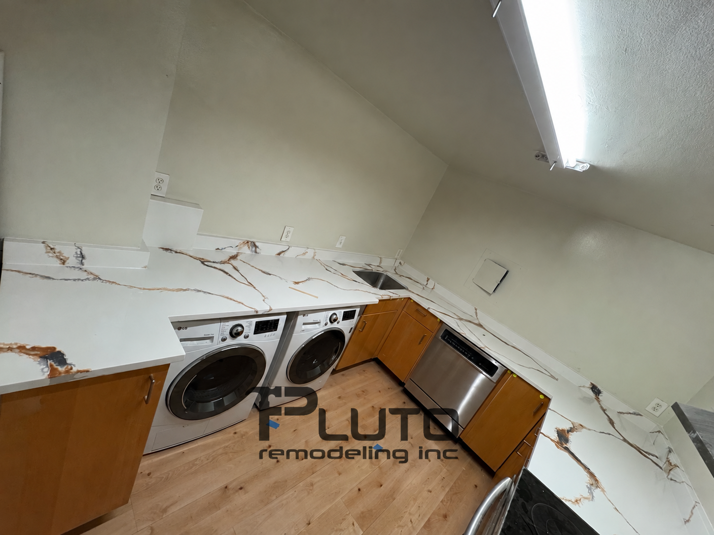 Countertops and laundry area — Pluto Remodeling
